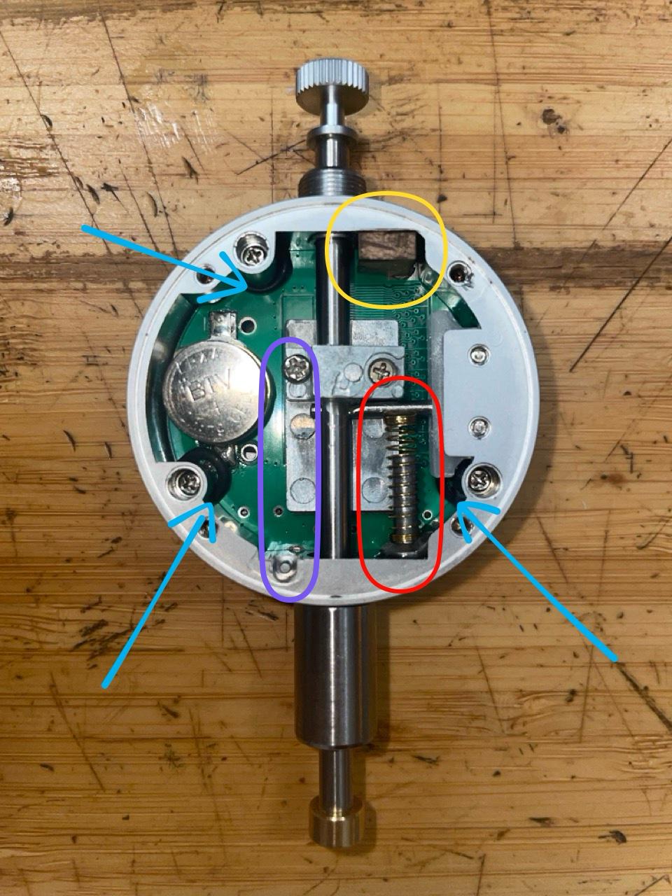 Modified nut slotting gauge with marked internal components